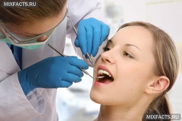 Воспаление десны около зуба