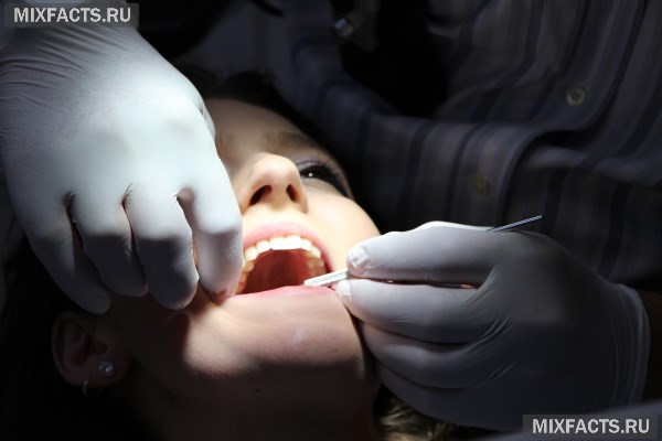 Что делать, если болит зуб под коронкой?